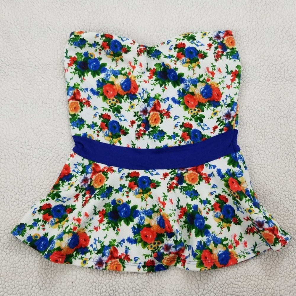 A strapless peplum shirt in a size small